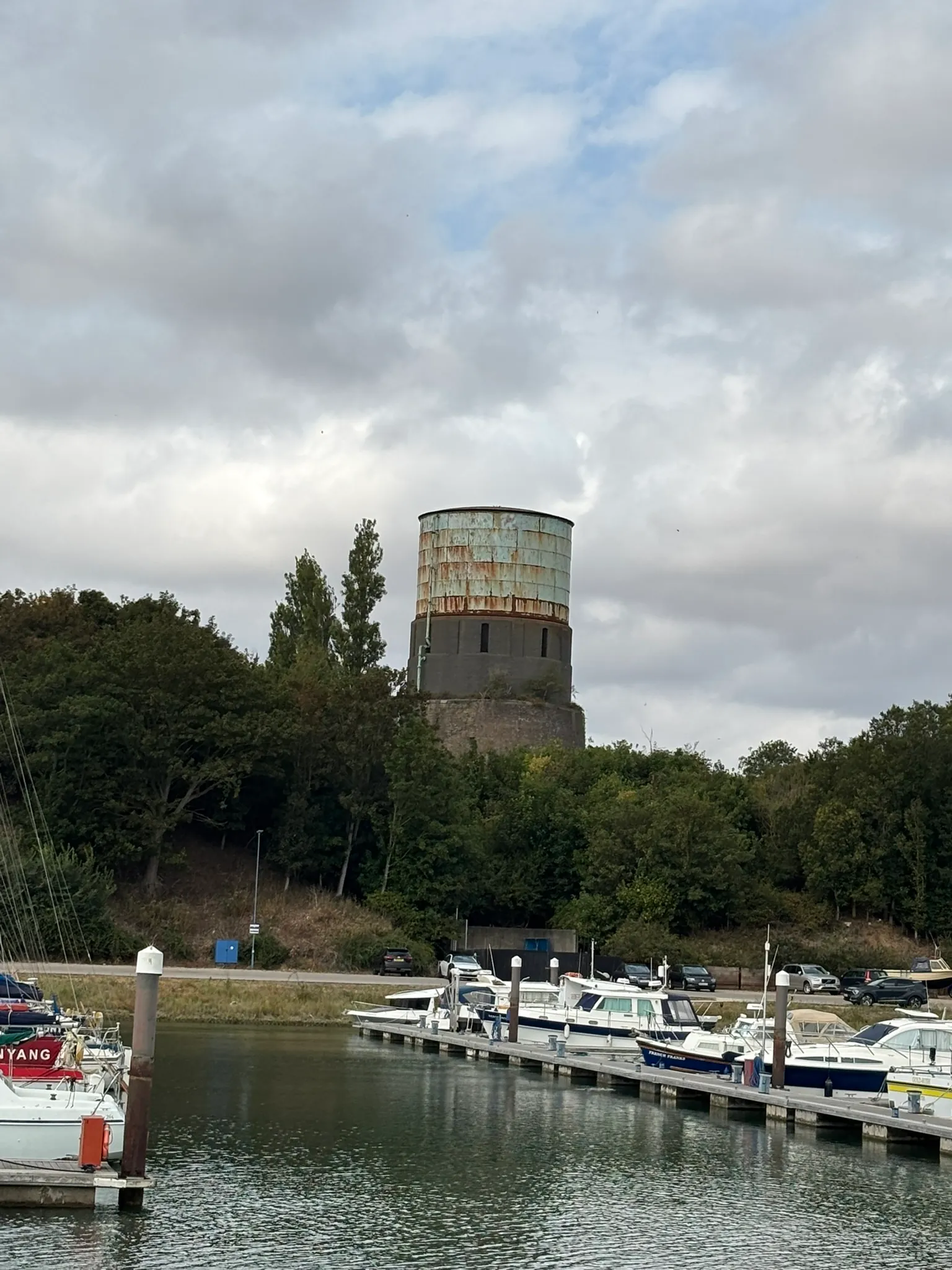 Boats in Shotley Marina with the historic water tower beyond.