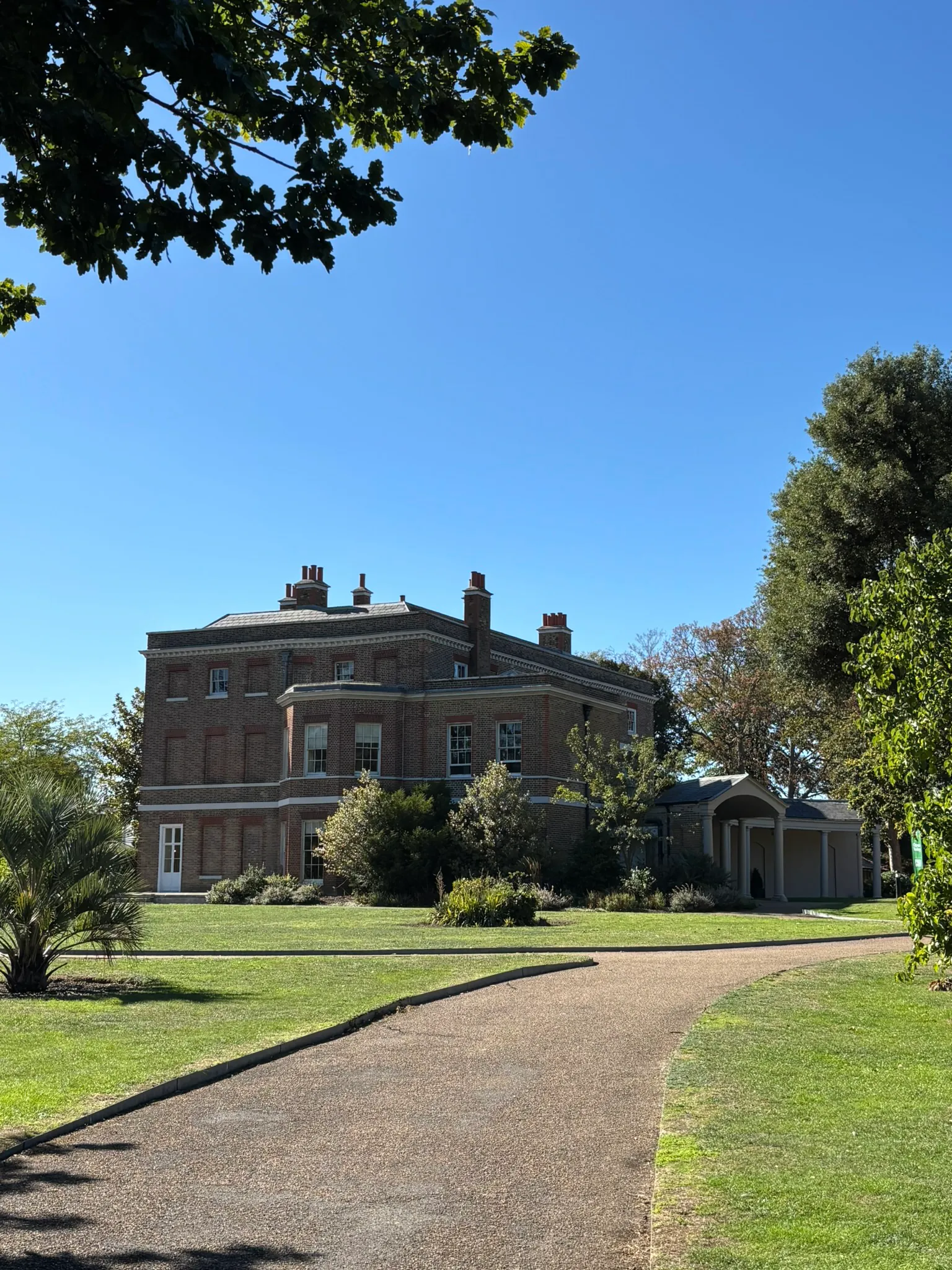 Valentines Mansion viewed from the gardens on a sunny day.
