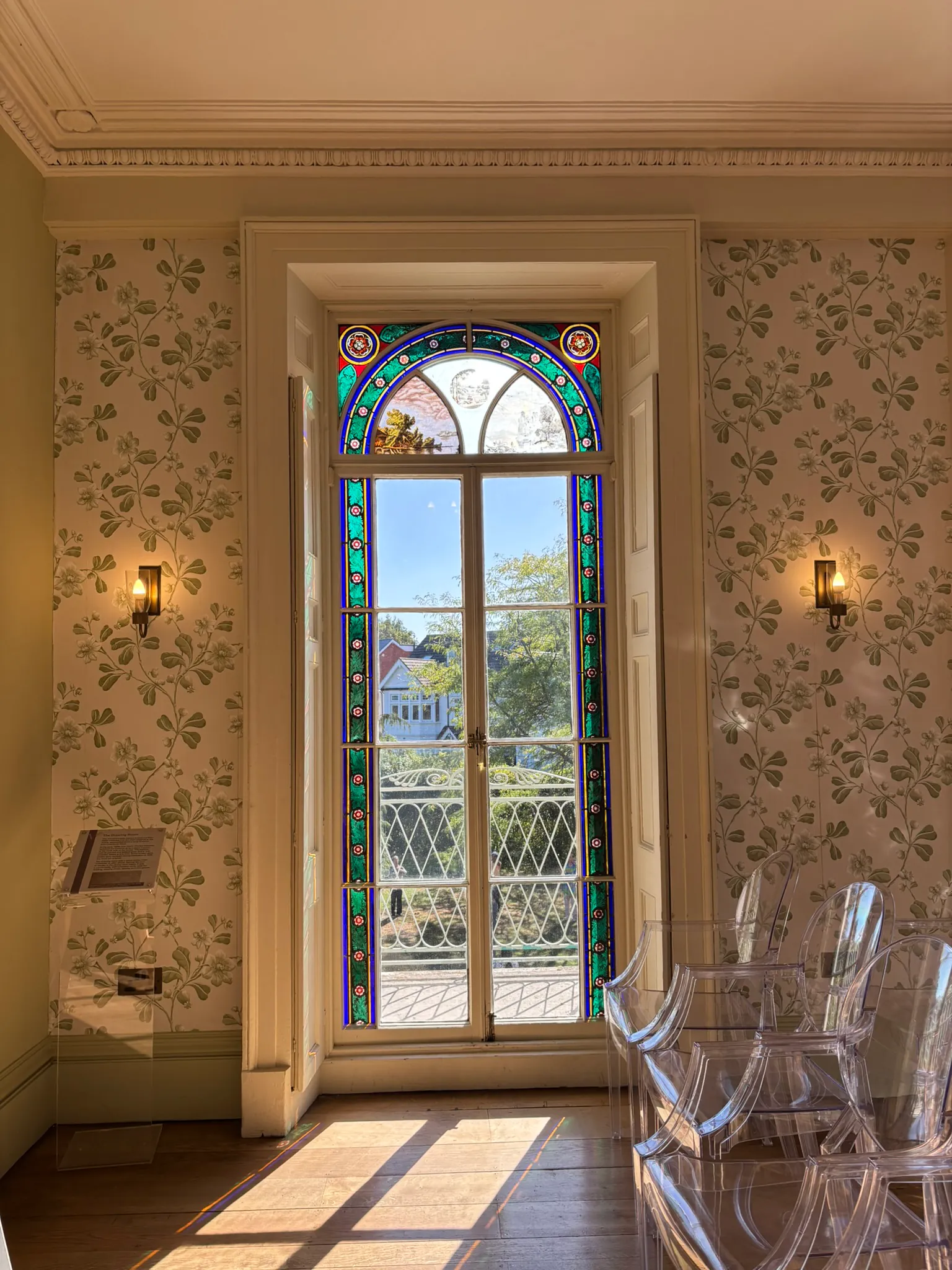 Decorative stained-glass window and period interior at Valentines Mansion.
